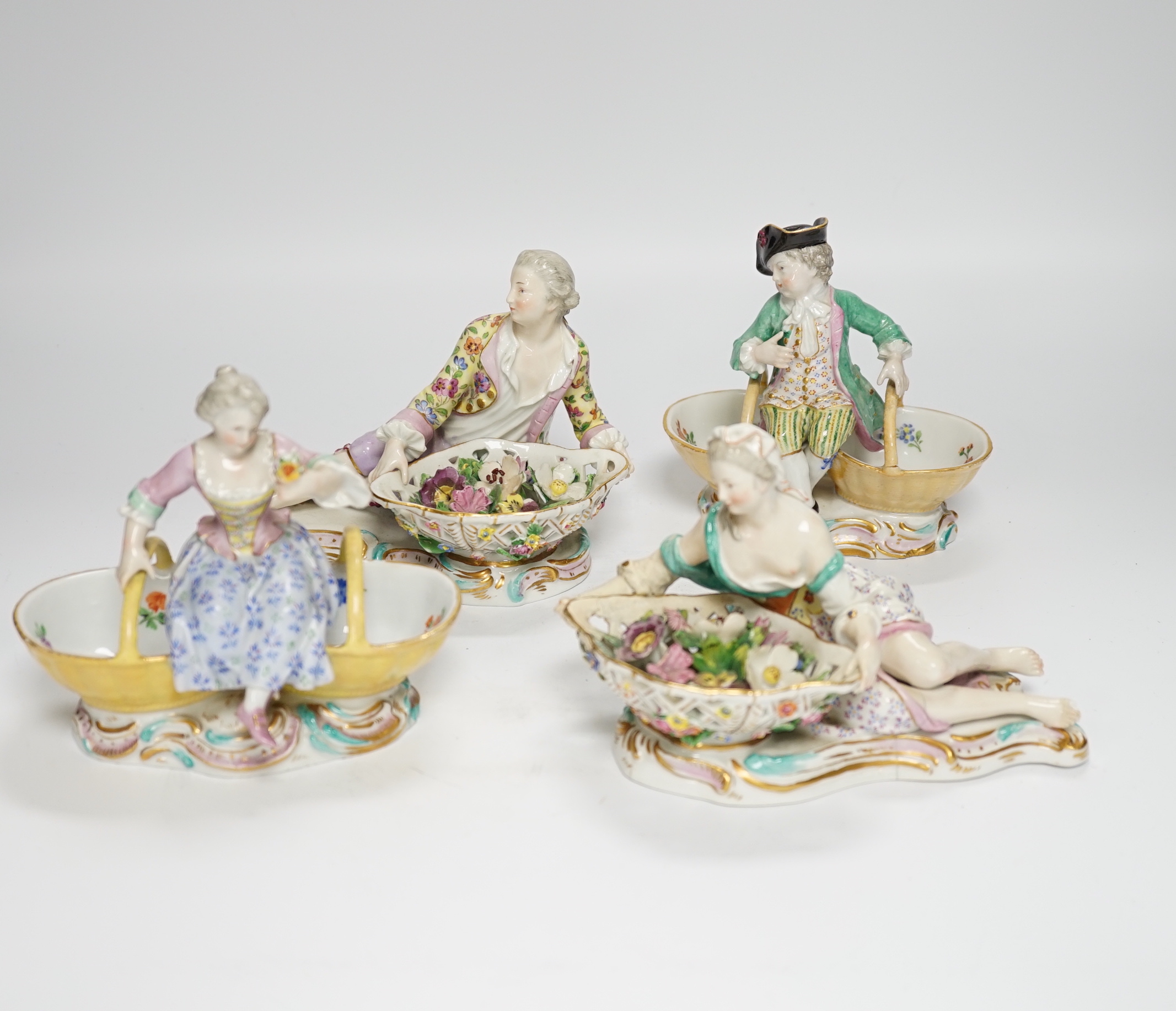 Two pairs of German porcelain figural basket groups, tallest 13cm